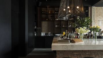 Rooftop bar, al fresco dining, open daily