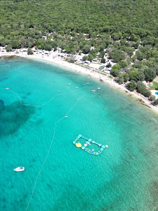 On the beach, sun-loungers, beach umbrellas, scuba diving