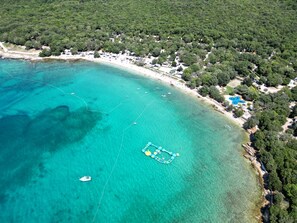 On the beach, sun-loungers, beach umbrellas, scuba diving