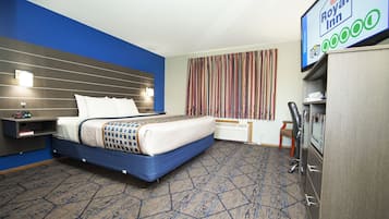 Chambre Deluxe, 1 très grand lit, non-fumeur | Ameublement unique, bureau, rideaux d’obscurcissement