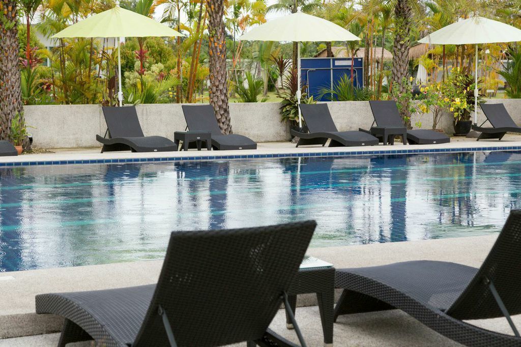 seasonal outdoor pool, pool umbrellas, pool loungers
