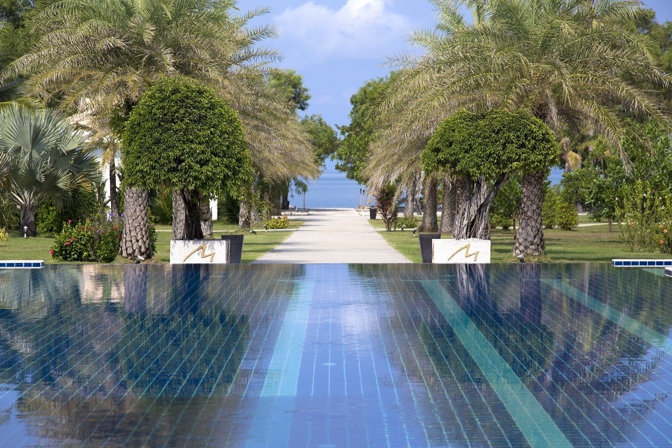 seasonal outdoor pool, pool umbrellas, pool loungers