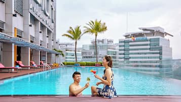 Outdoor pool, open 6:00 AM to 11:00 PM, pool umbrellas, pool loungers