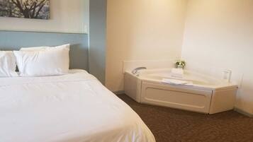 Deluxe Room, 1 King Bed, Jetted Tub | Premium bedding, iron/ironing board (on request), WiFi (free)