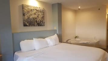 Deluxe Room, 1 King Bed, Jetted Tub | Premium bedding, individually decorated, individually furnished