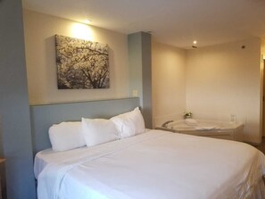 Deluxe Room, 1 King Bed, Jetted Tub | Premium bedding, individually decorated, individually furnished