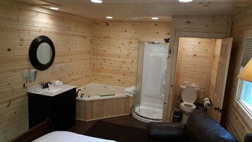 Cabaña Deluxe, 1 habitación | Baño | Artículos de higiene personal gratuitos, secador de pelo y toallas