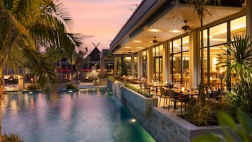 Breakfast, lunch, dinner served; international cuisine, pool views