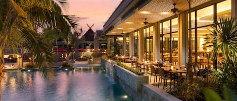 Breakfast, lunch, dinner served; international cuisine, pool views