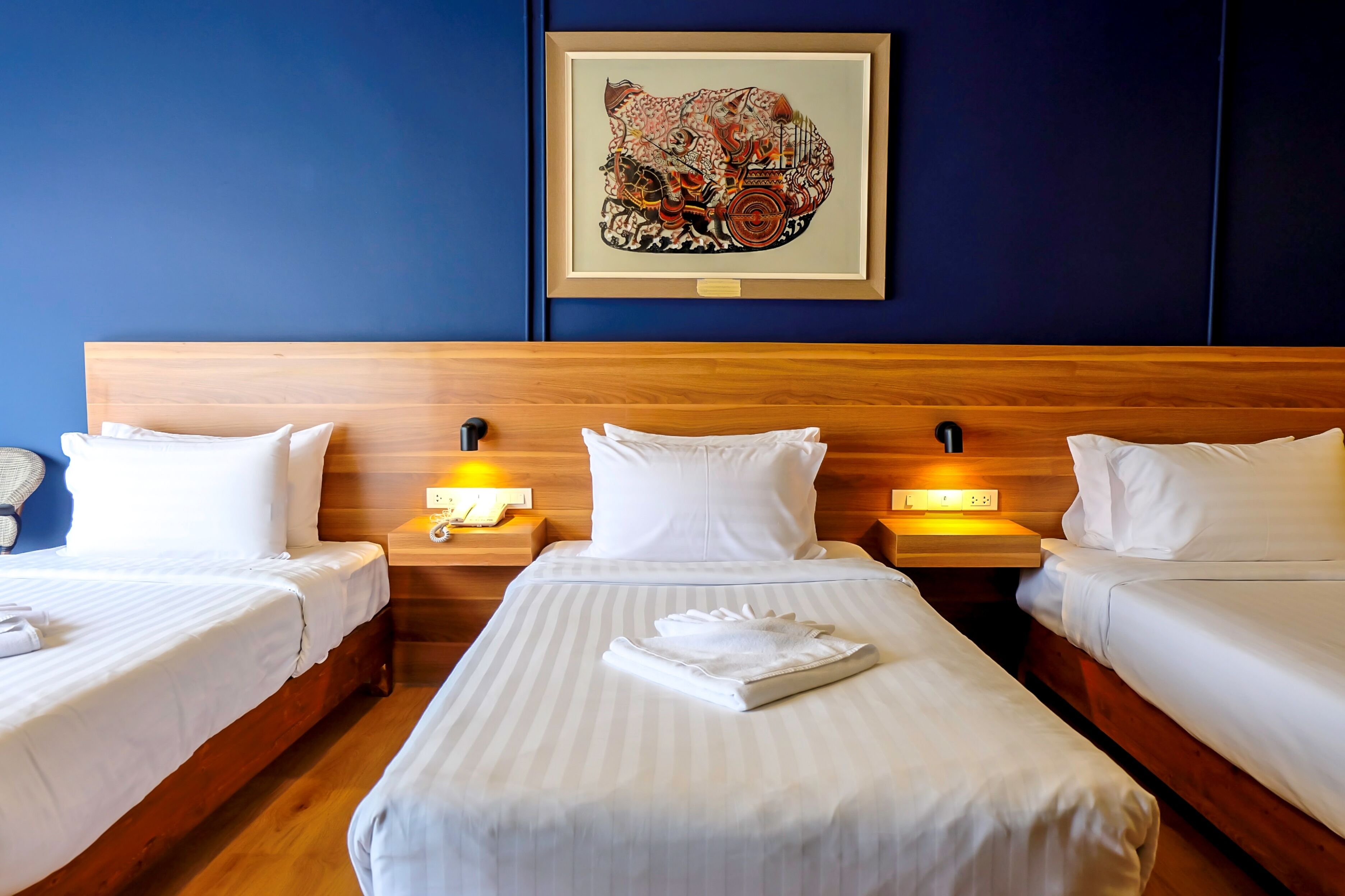 classic triple room, 3 single beds | 1 bedroom, pillow-top beds, minibar, in-room safe