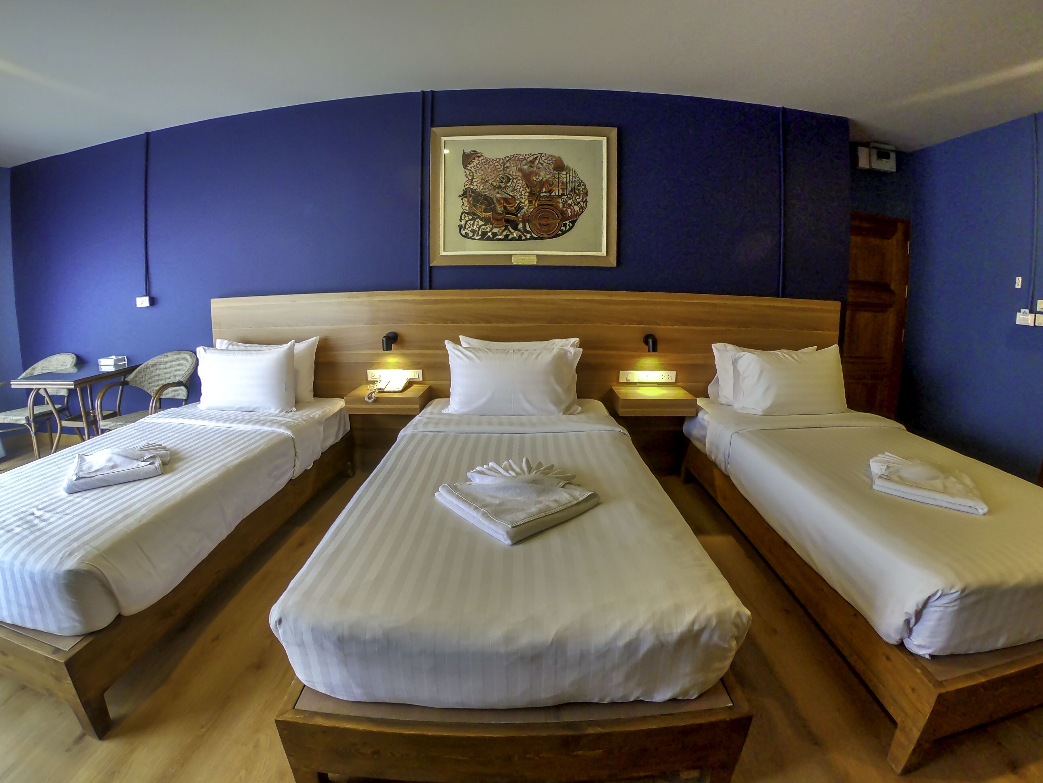 classic triple room, 3 single beds | 1 bedroom, pillow-top beds, minibar, in-room safe