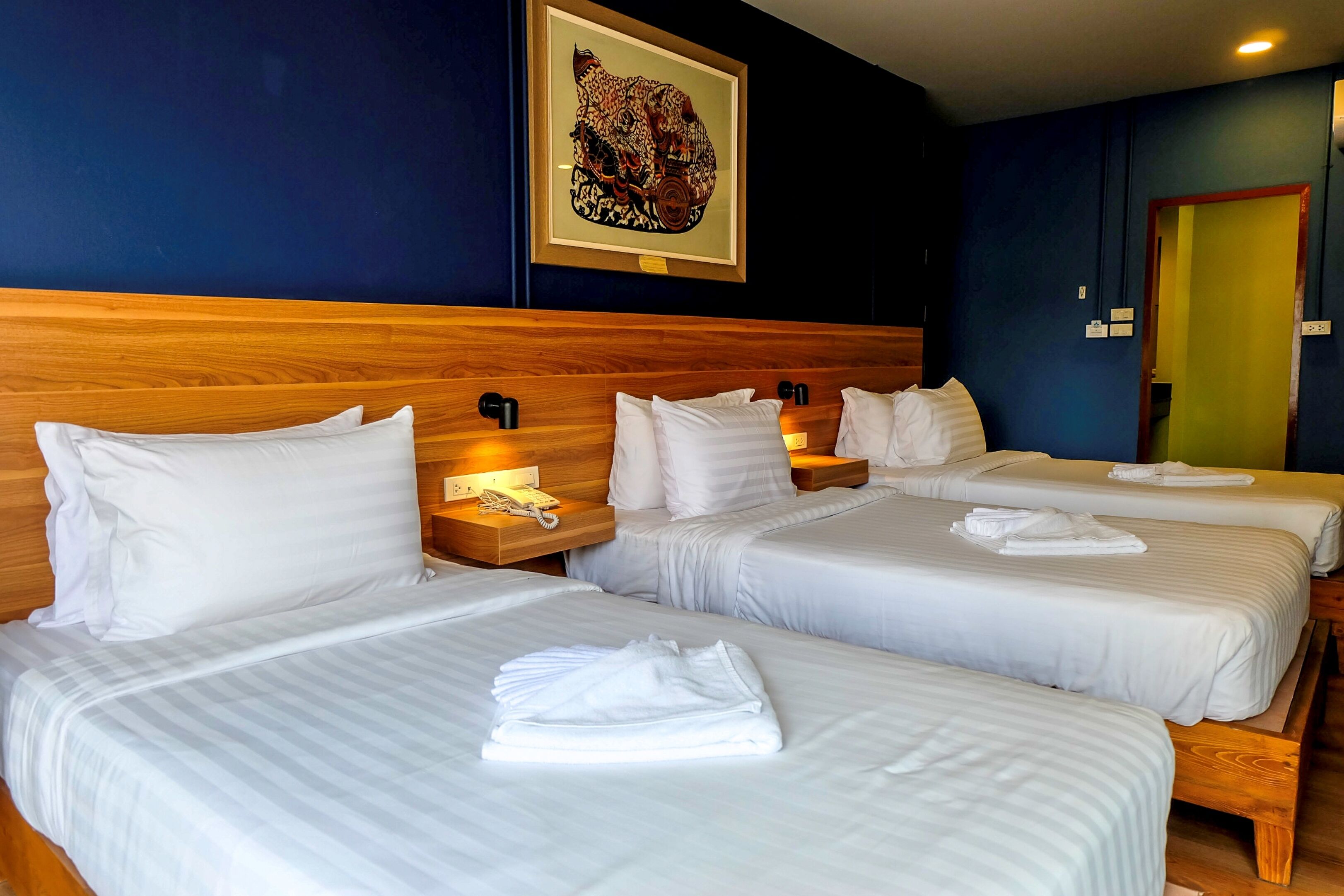 classic triple room, 3 single beds | 1 bedroom, pillow-top beds, minibar, in-room safe