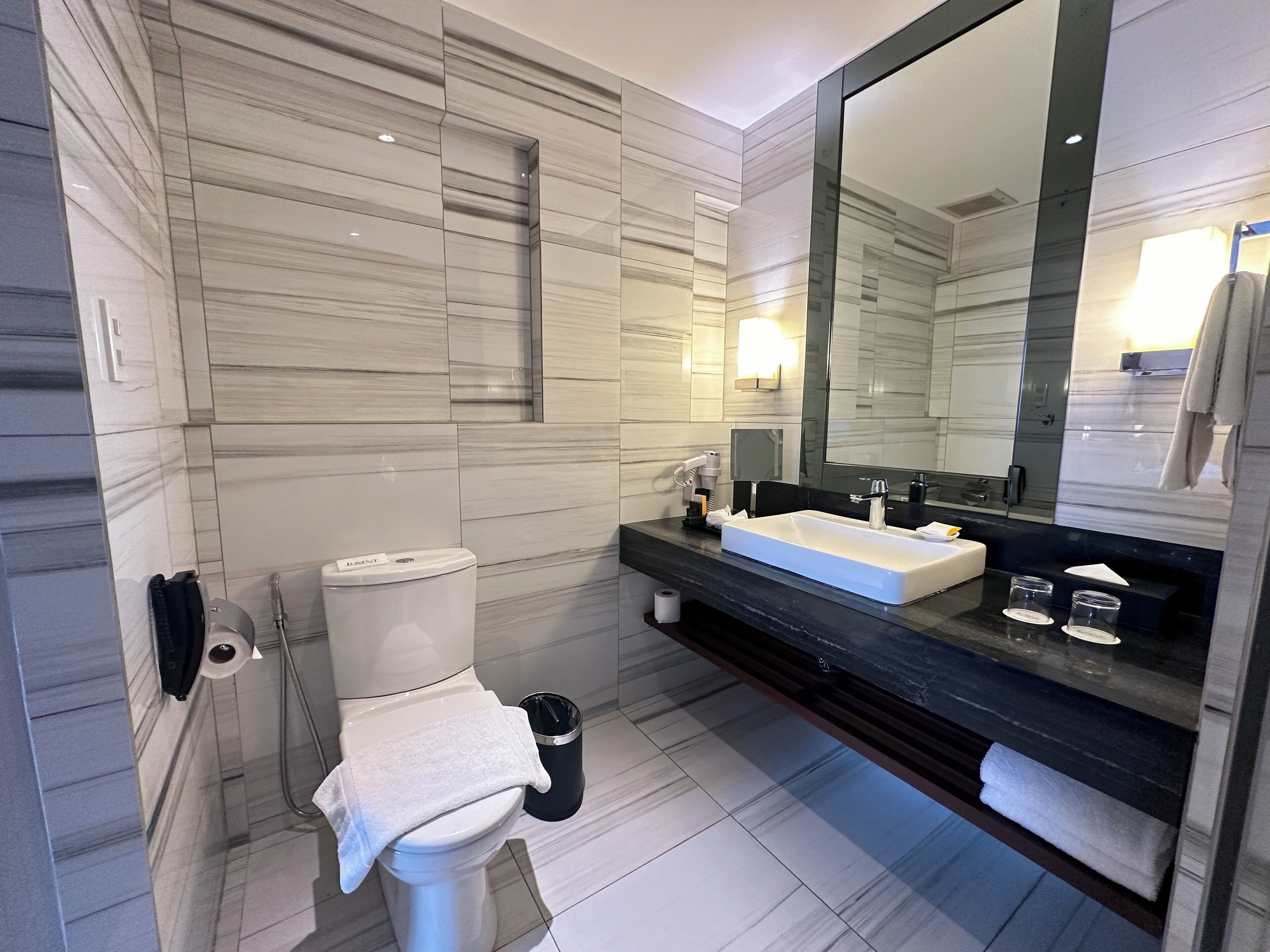 prima club suite | bathroom | free toiletries, hair dryer, bathrobes, slippers