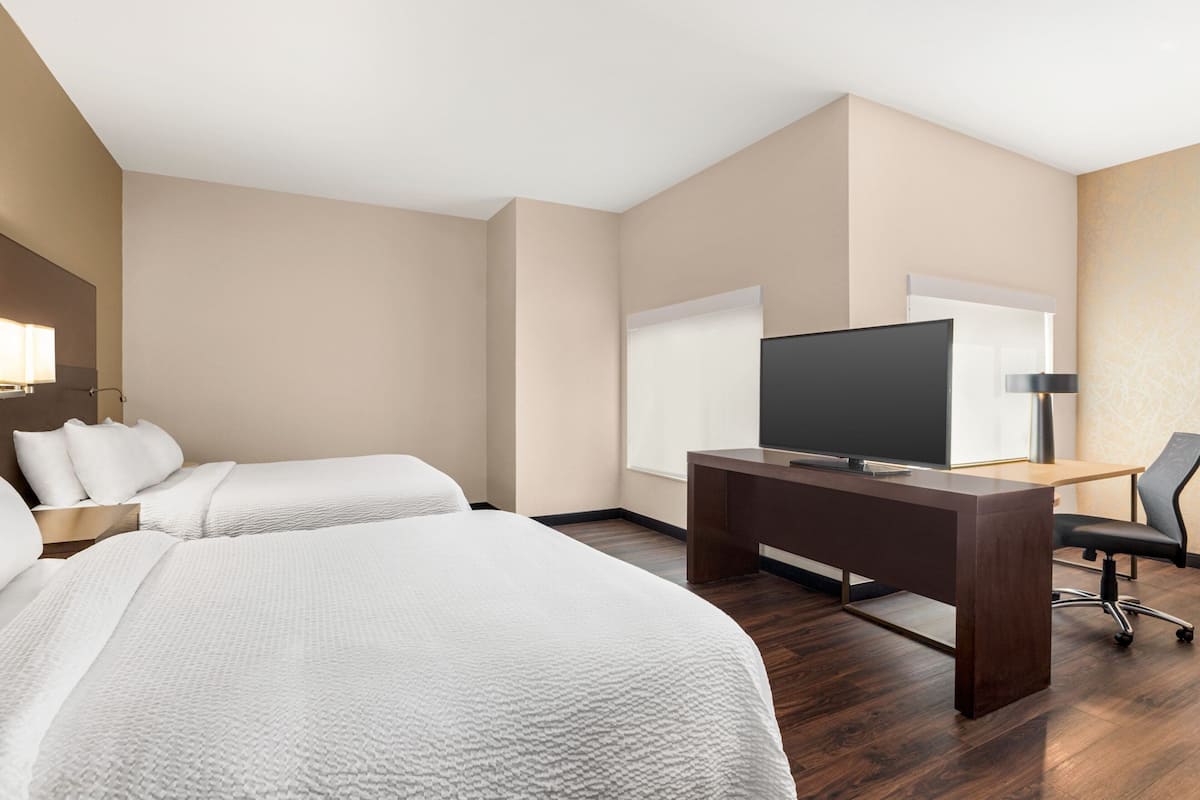 Studio Suite, Multiple Beds | 1 bedroom, desk, iron/ironing board, free cribs/infant beds