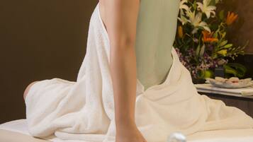 Experience a serene spa retreat with a soothing massage, warm oil, and calming ambiance.