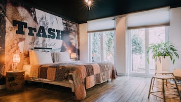 Quadruple Room | Minibar, in-room safe, individually decorated, individually furnished