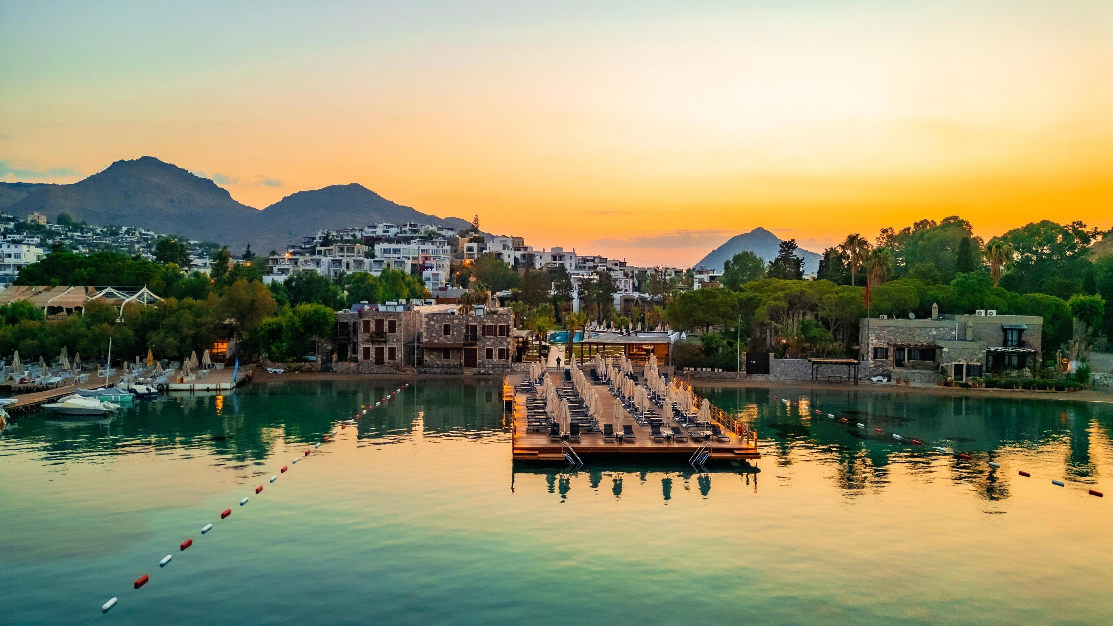 Playa privada, sillas reclinables de playa, sombrillas, toallas de playa