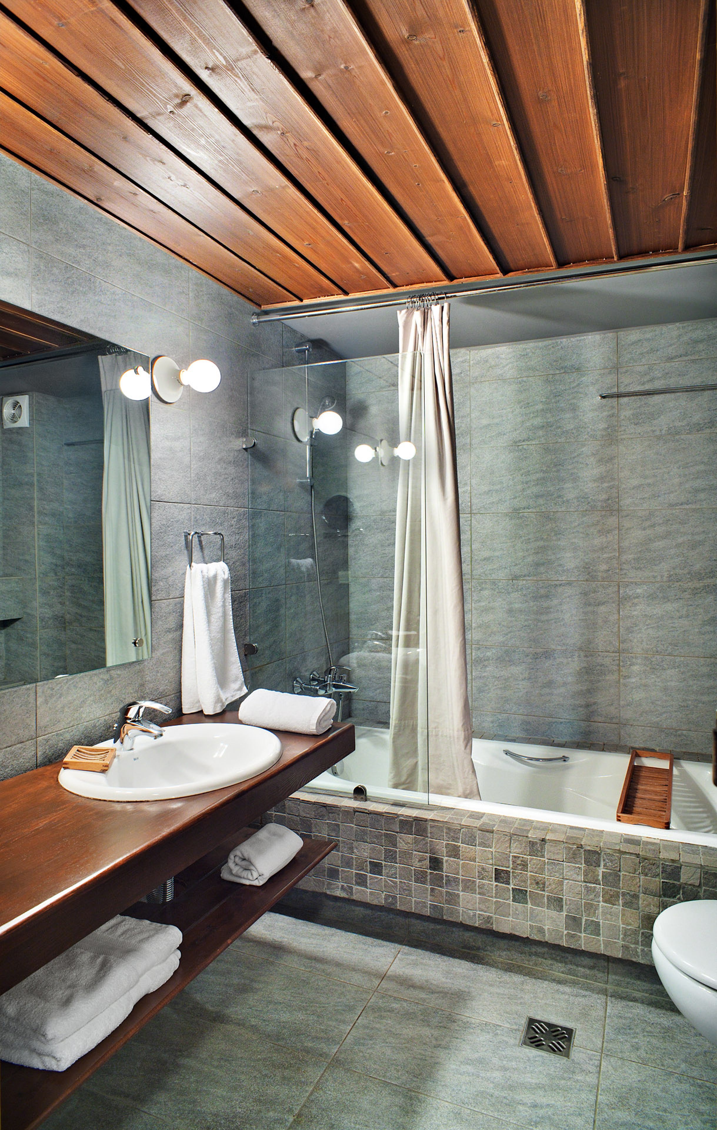 hair dryer, bathrobes, slippers, towels