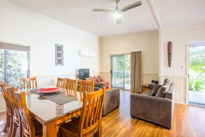 3 Bedroom Deluxe Villa | Living area | TV, DVD player, ping pong - Fingal Bay Holiday Park (Fingal Bay)
