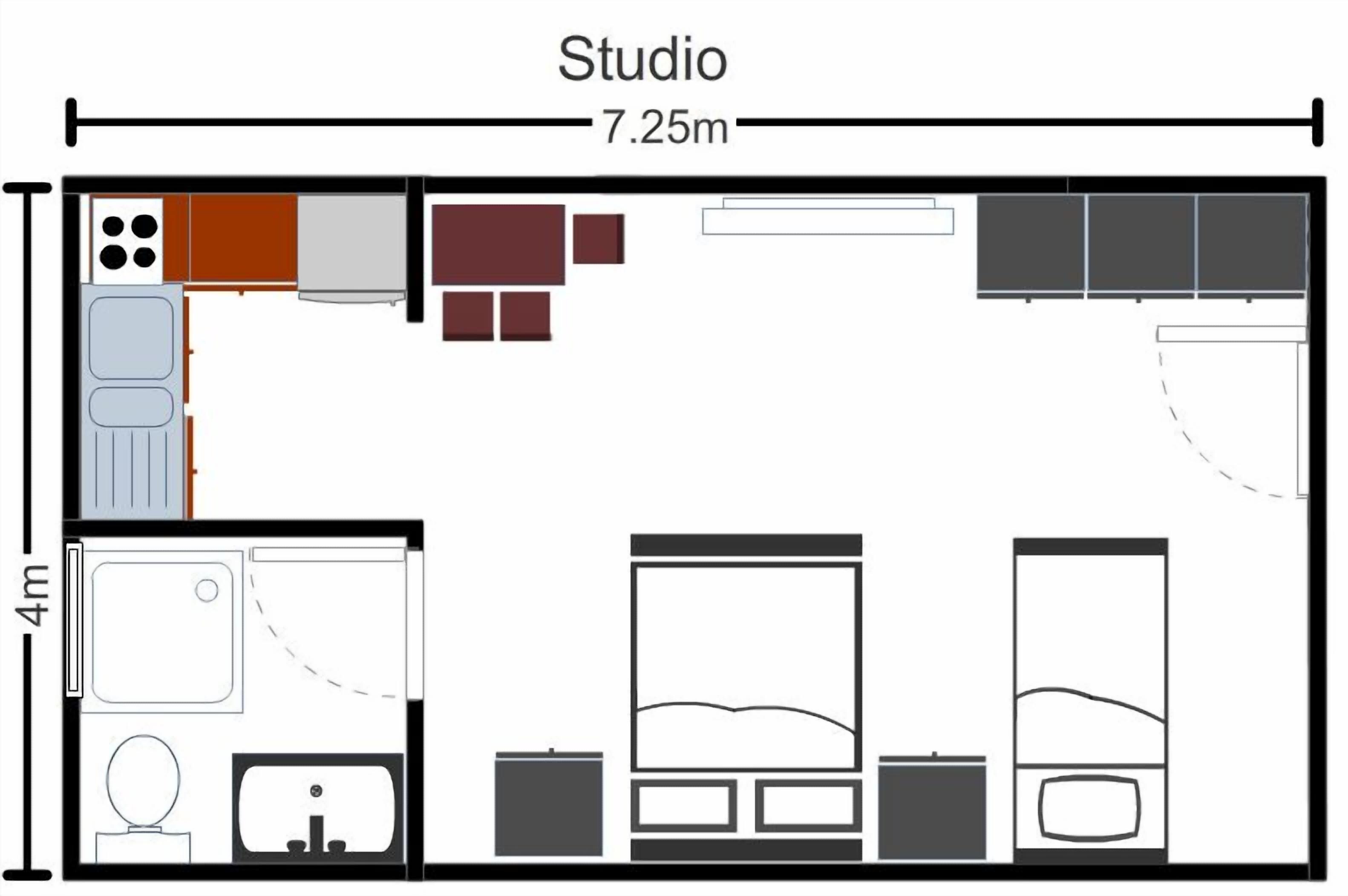 Distribución de un estudio de 7,25 metros por 4 metros, con kitchenette, un baño pequeño, cama y zona de estar.