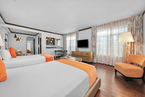 Studio, 2 Queen Beds | Living area | 42-inch plasma TV with cable channels, TV, iPod dock