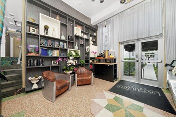 Hotel entrance and lobby at Lincoln Arms Suites