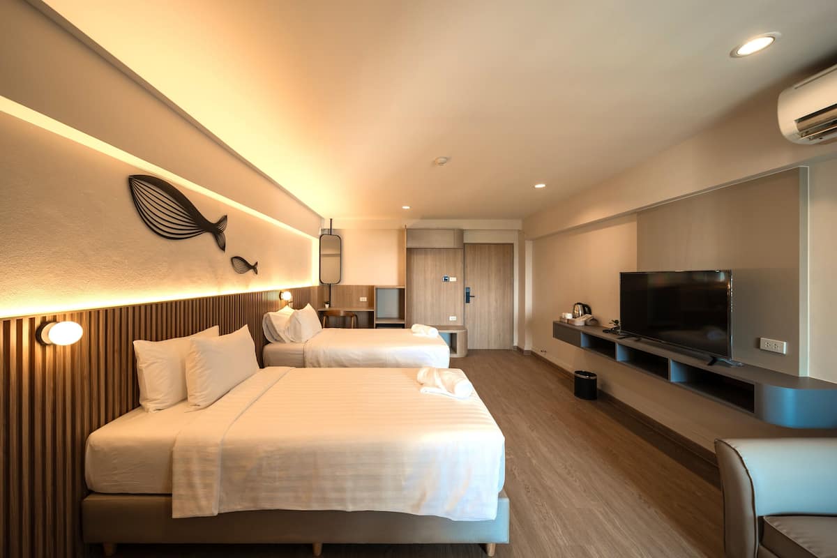 デラックス ツインルーム シングルベッド 2 台 | ミニバー、WiFi (無料)、ベッドシーツ