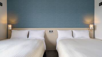 Down duvets, desk, blackout curtains, iron/ironing board