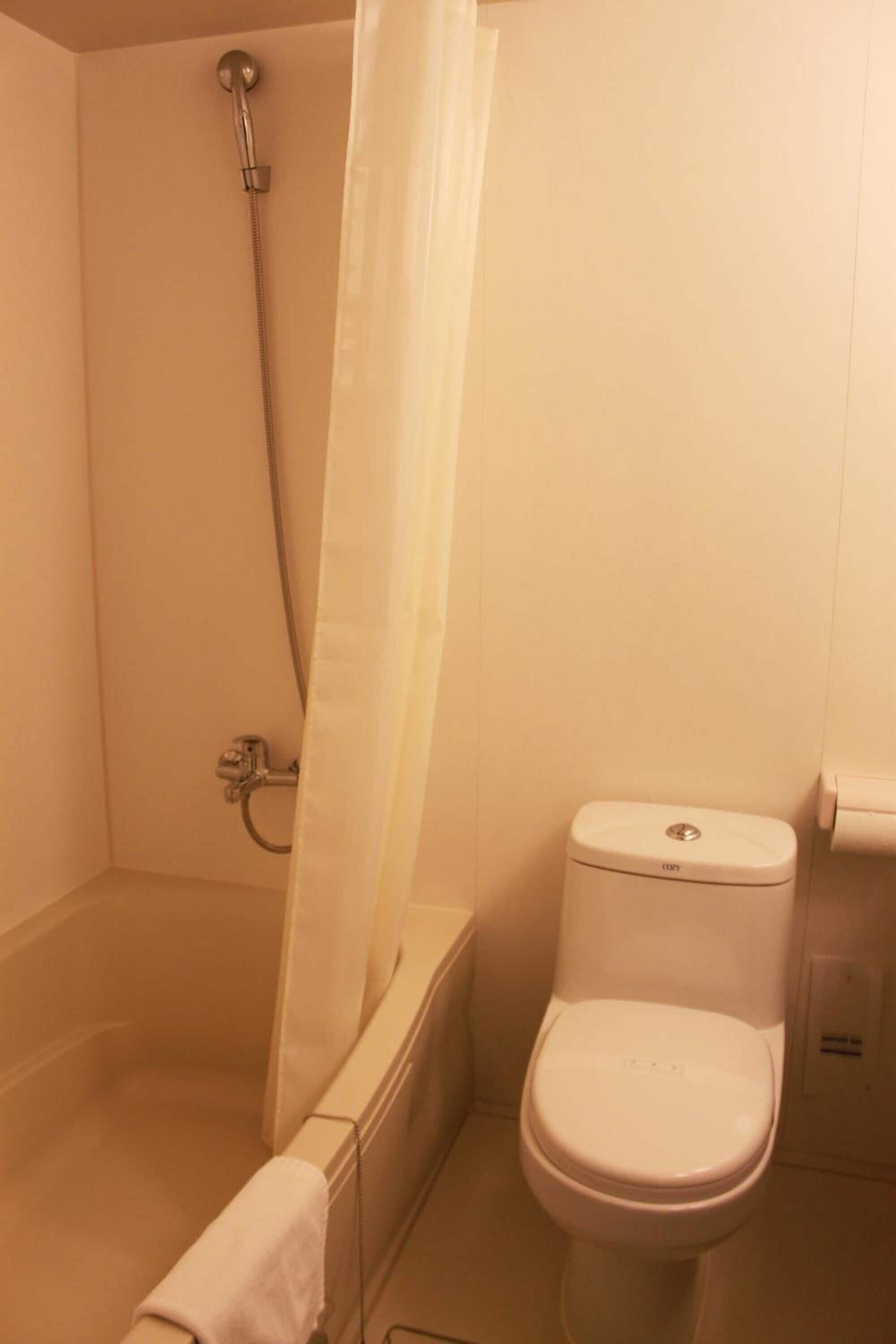 hair dryer, slippers, towels