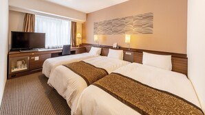 A hotel room with two beds, a desk with a television, and a wall-mounted artwork. - Vessel Inn Sapporo Nakajima Park (Sapporo)