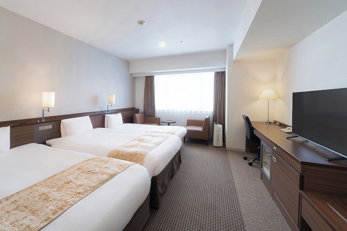 Quarto triplo superior, para não fumantes | Escrivaninha, cortinas blackout, ferros/tábuas de passar roupa