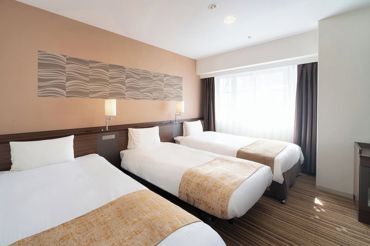 Quarto premier, para não fumantes (for 3 people) | Escrivaninha, cortinas blackout, ferros/tábuas de passar roupa