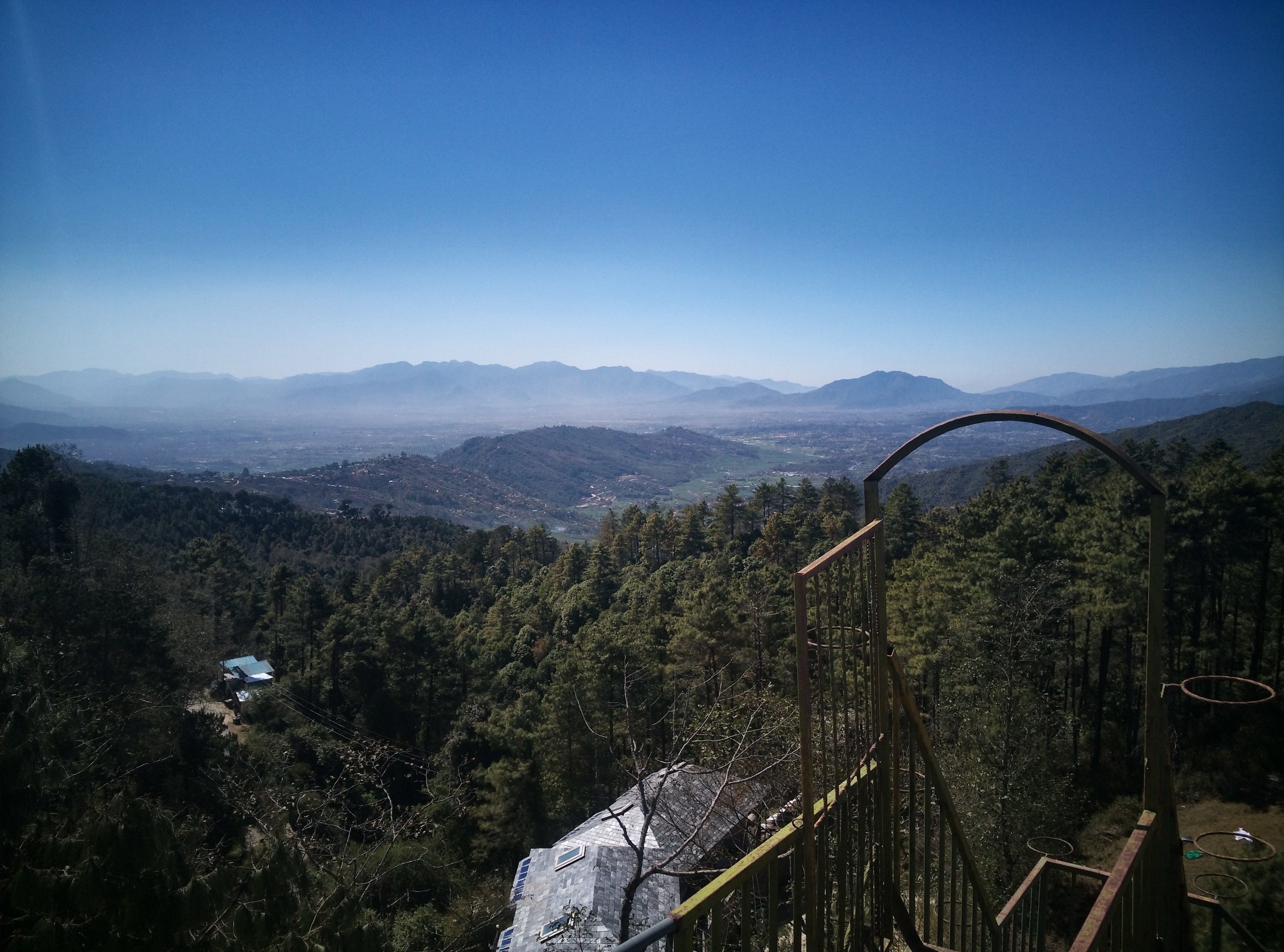 A mountainous landscape with a clear sky.