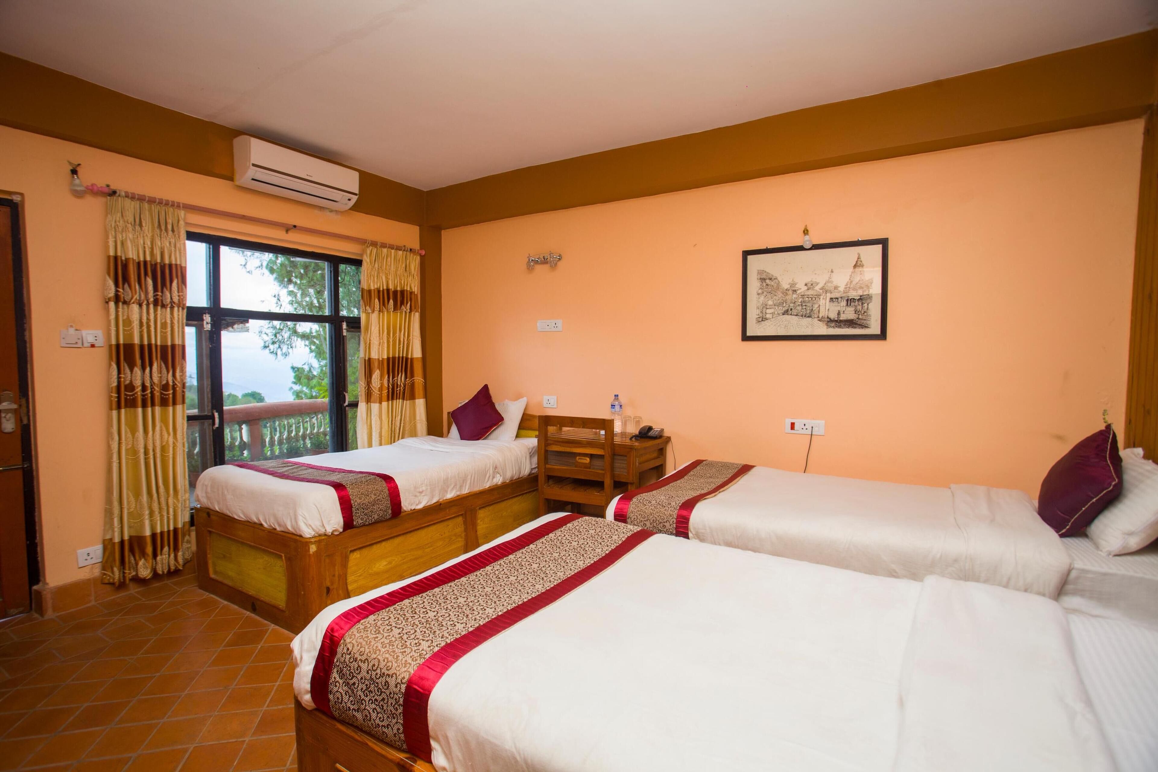 A hotel room with two single beds, an air conditioning unit, a wooden nightstand, a framed picture on the wall, and a window with curtains.