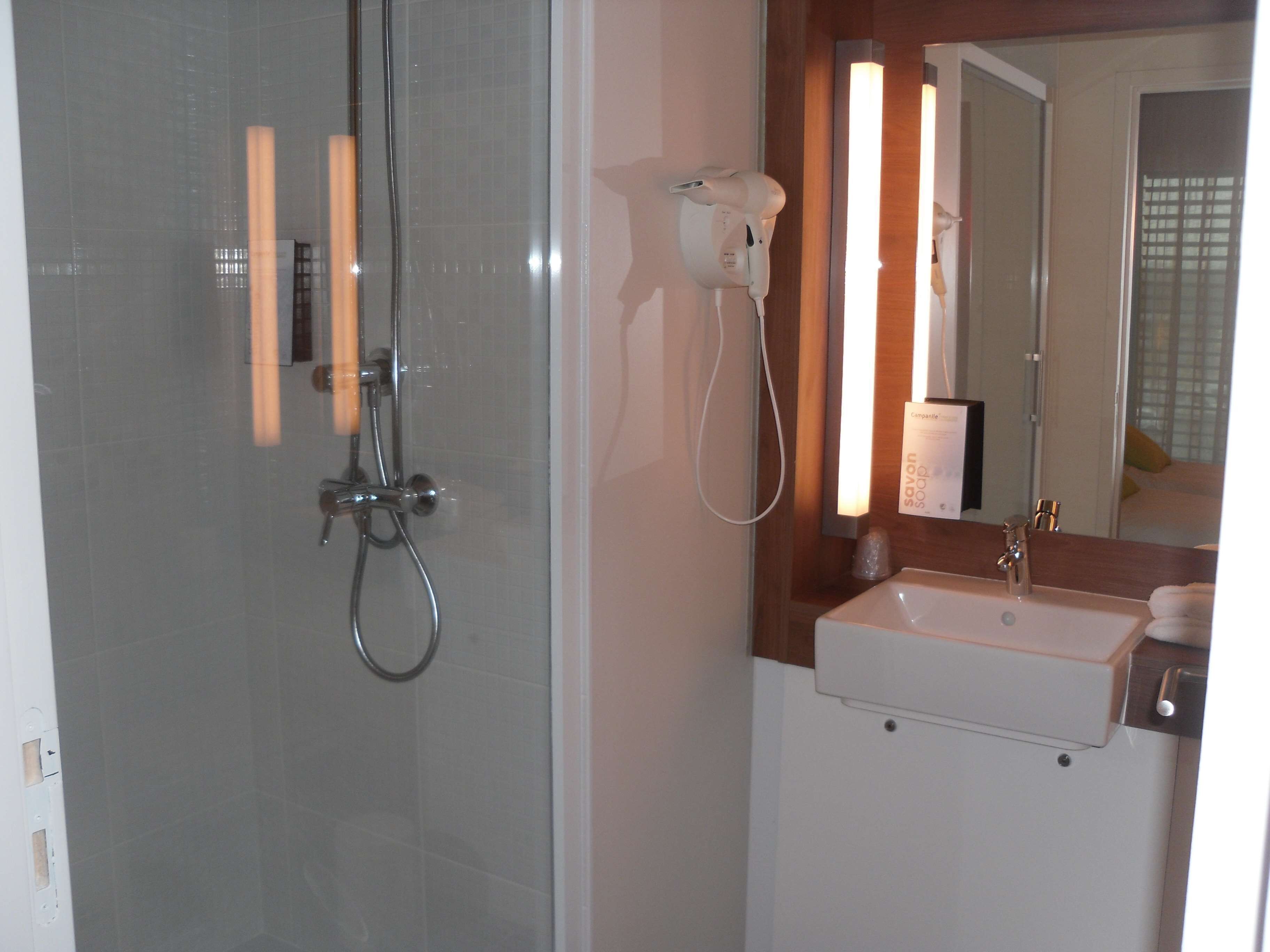 eco-friendly toiletries, hair dryer, towels