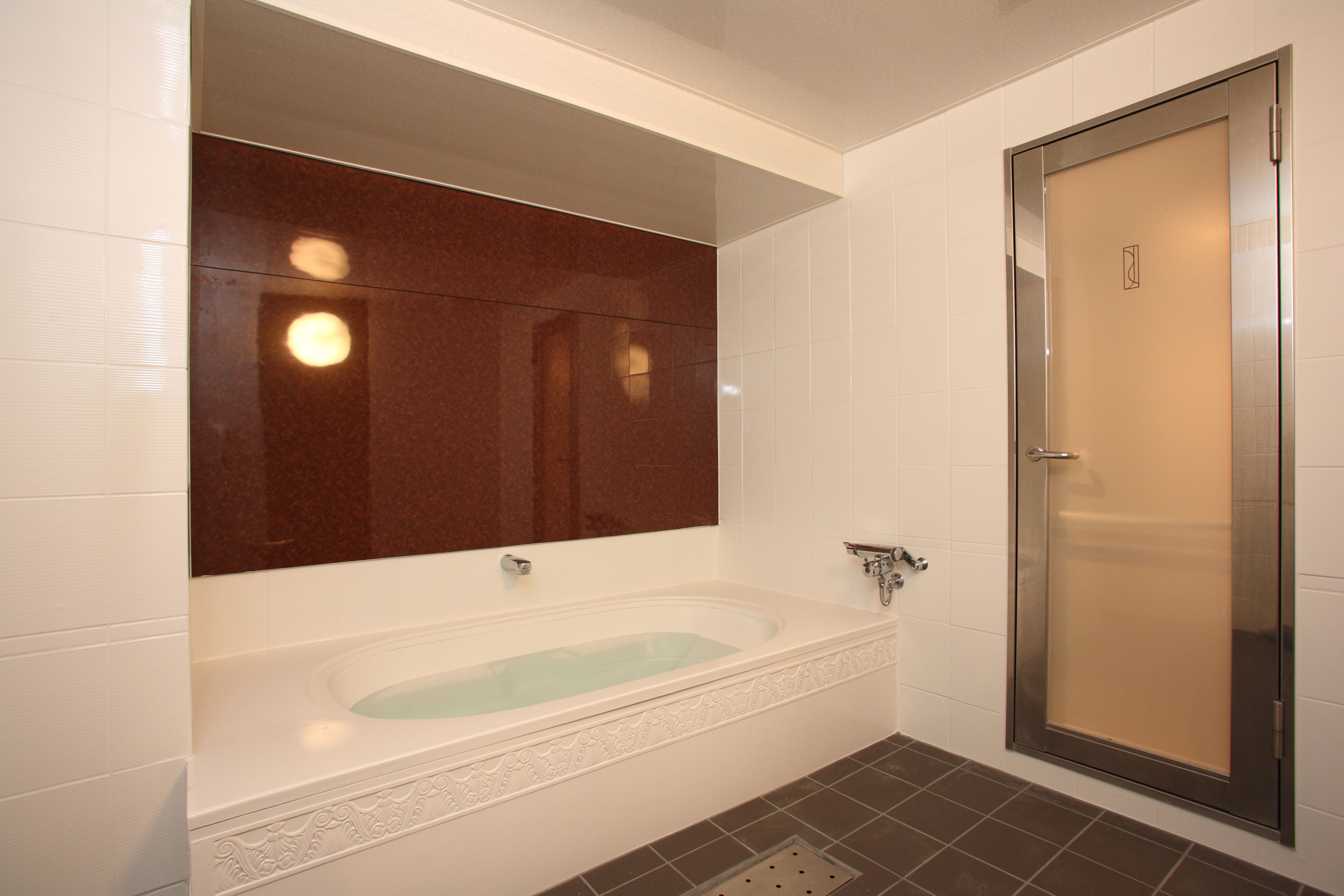 separate bathtub and shower, free toiletries, hair dryer, slippers