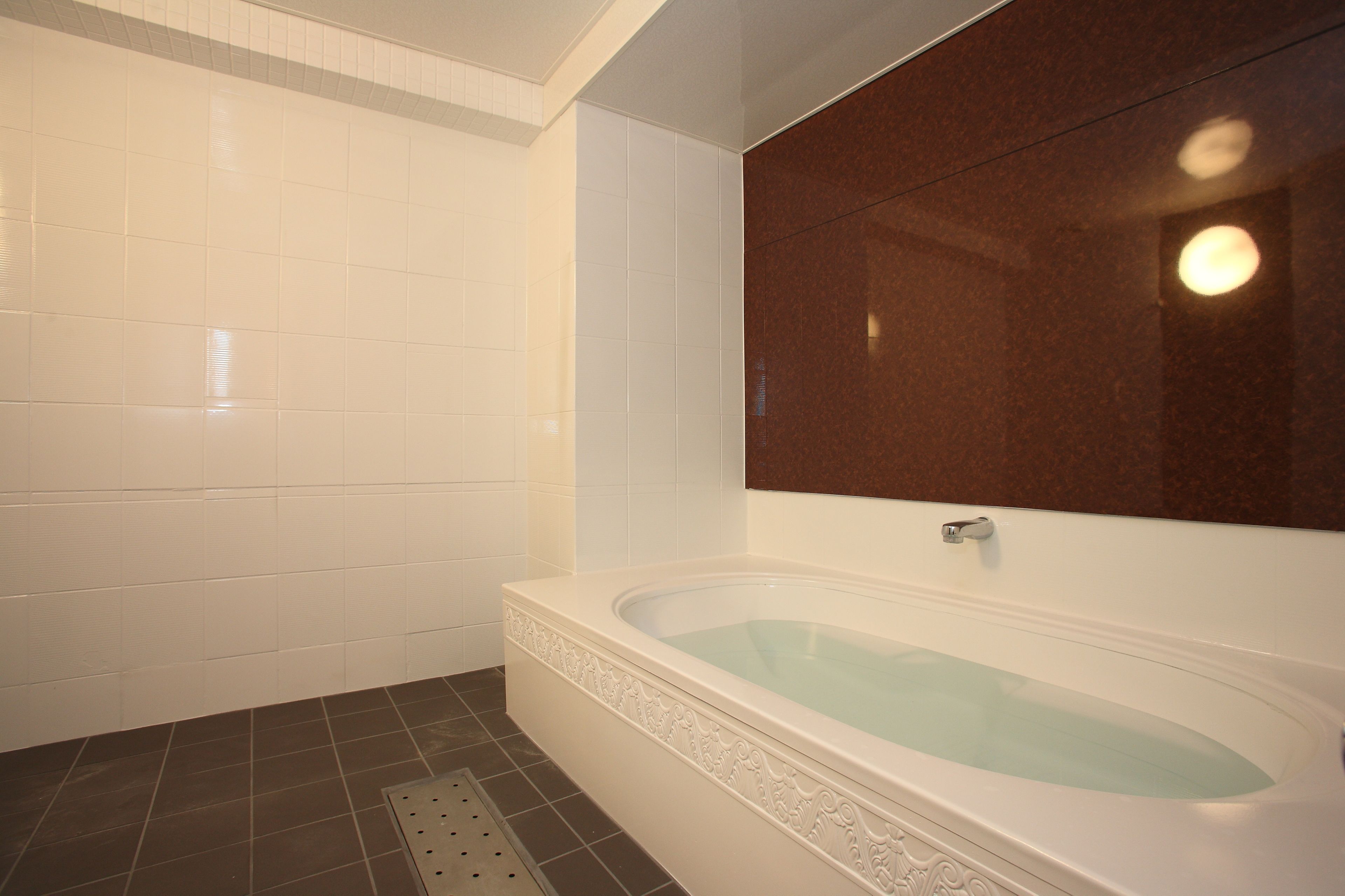 separate bathtub and shower, free toiletries, hair dryer, slippers