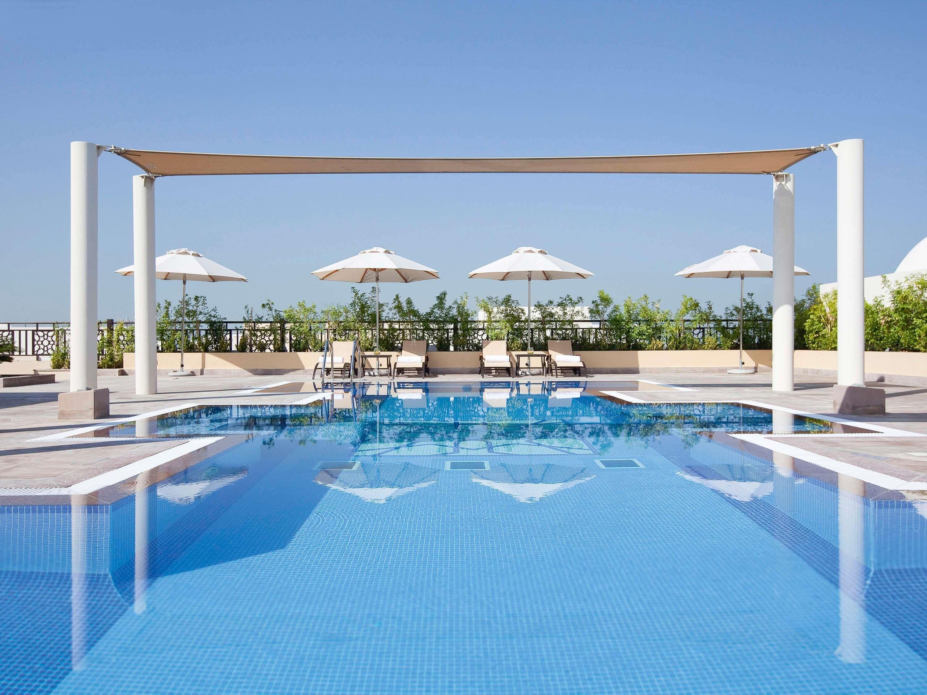 Outdoor pool, open 8:00 AM to 8:00 PM, sun loungers
