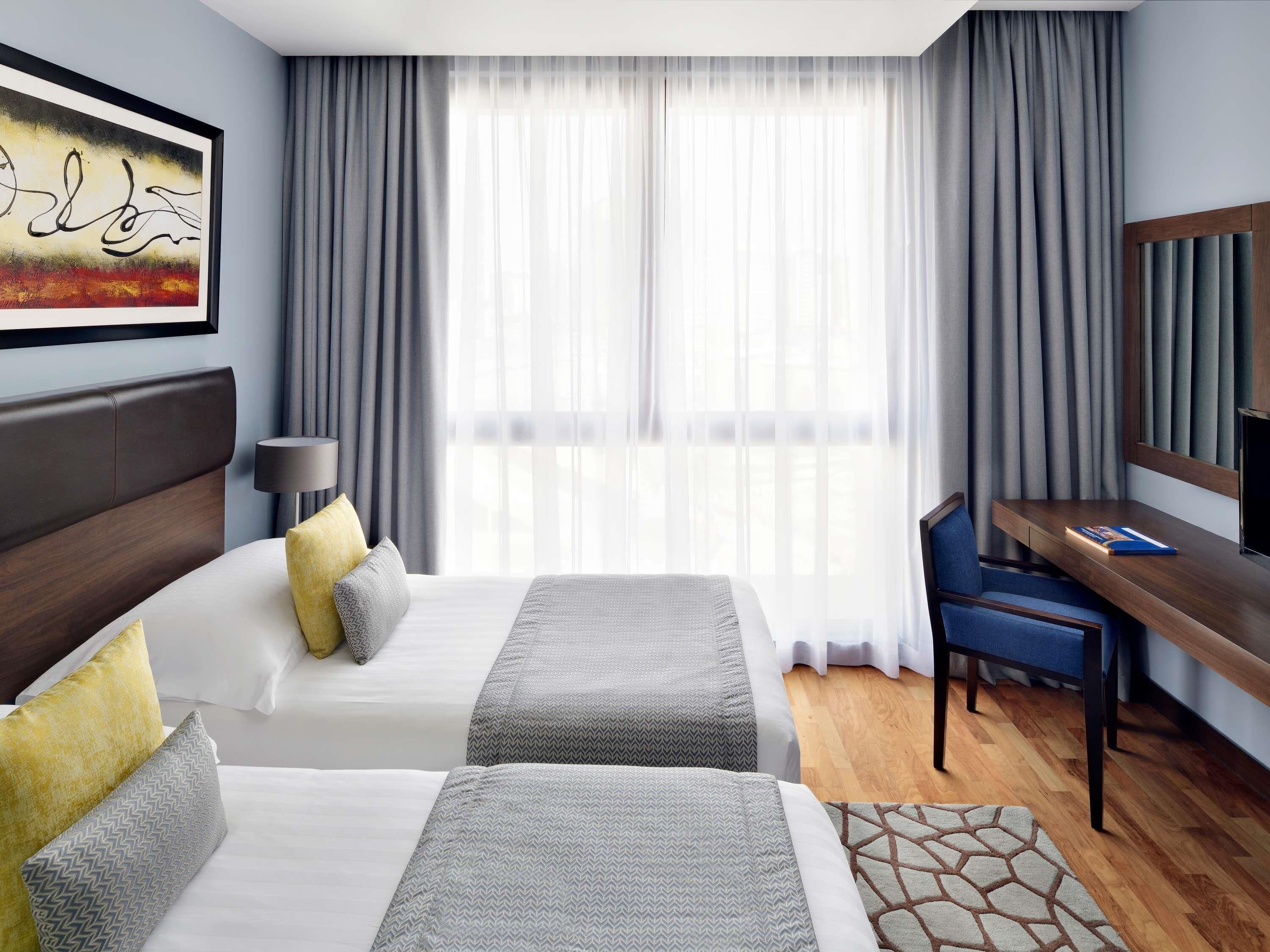 Apartment, 2 Bedrooms | In-room safe, individually decorated, individually furnished, desk