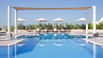 Outdoor pool, open 8:00 AM to 8:00 PM, sun loungers