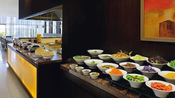 Breakfast, lunch, dinner served; international cuisine