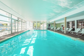 Indoor pool, seasonal outdoor pool, pool umbrellas, pool loungers