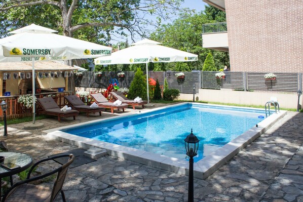 Outdoor pool, open 8:00 AM to 8:00 PM, pool umbrellas, sun loungers