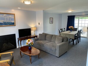 Luxury Room | Living area | 32-inch TV with cable channels - The Taber Inne & Suites (Mystic)