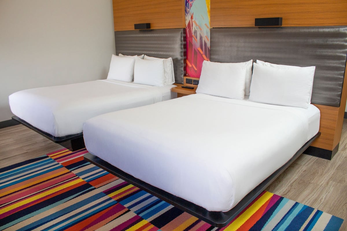 Room, 2 Queen Beds | Premium bedding, down comforters, in-room safe, desk