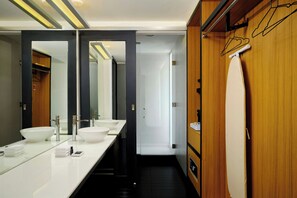 Shower, designer toiletries, hair dryer, towels