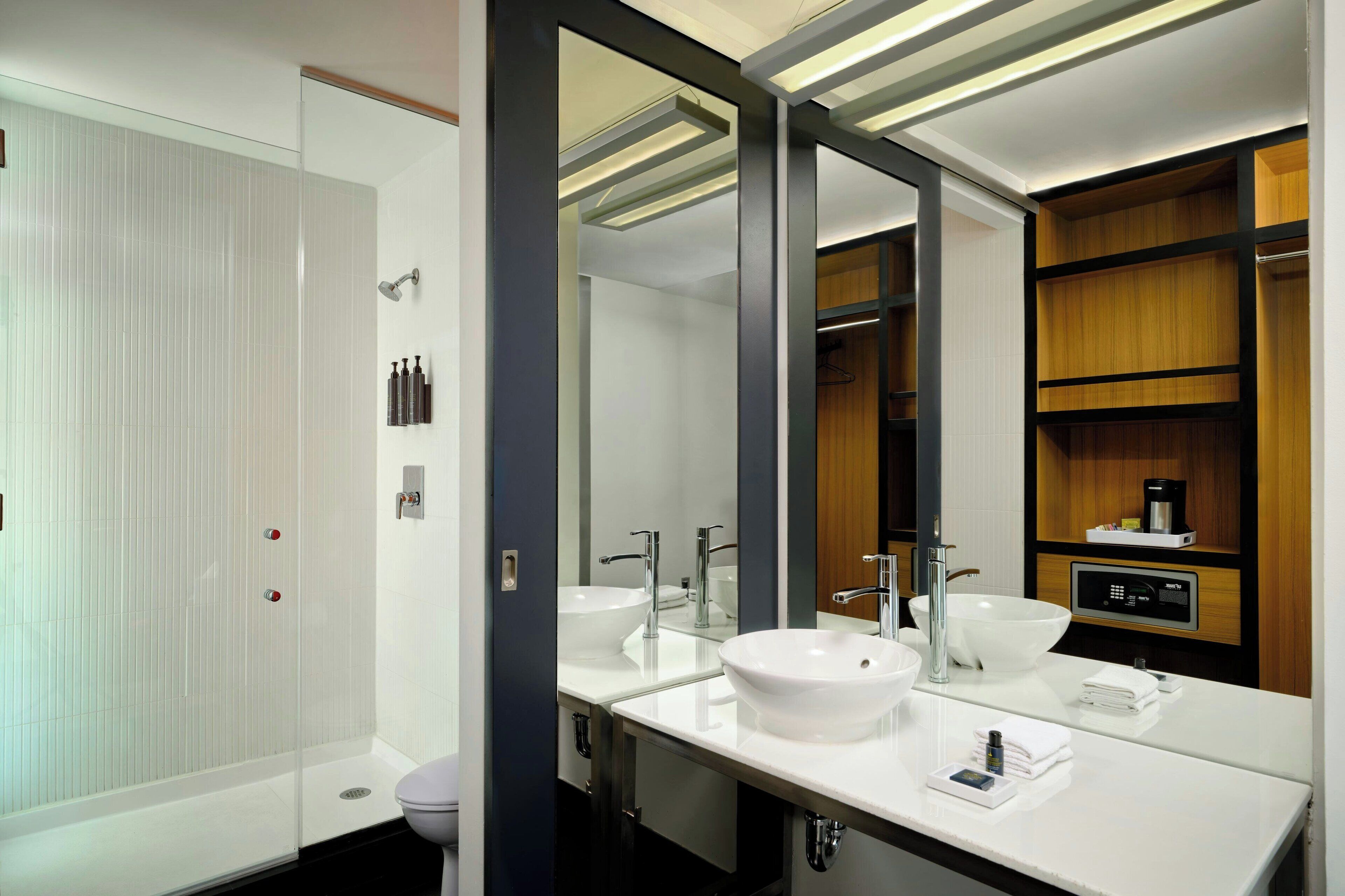 room, 1 king bed | bathroom | shower, designer toiletries, hair dryer, towels