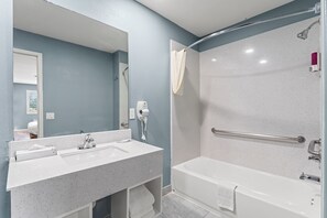 Suite, 1 King Bed, Non Smoking, Jetted Tub | Bathroom | Combined shower/tub, free toiletries, towels - Executive Inn and Suites (Magnolia)
