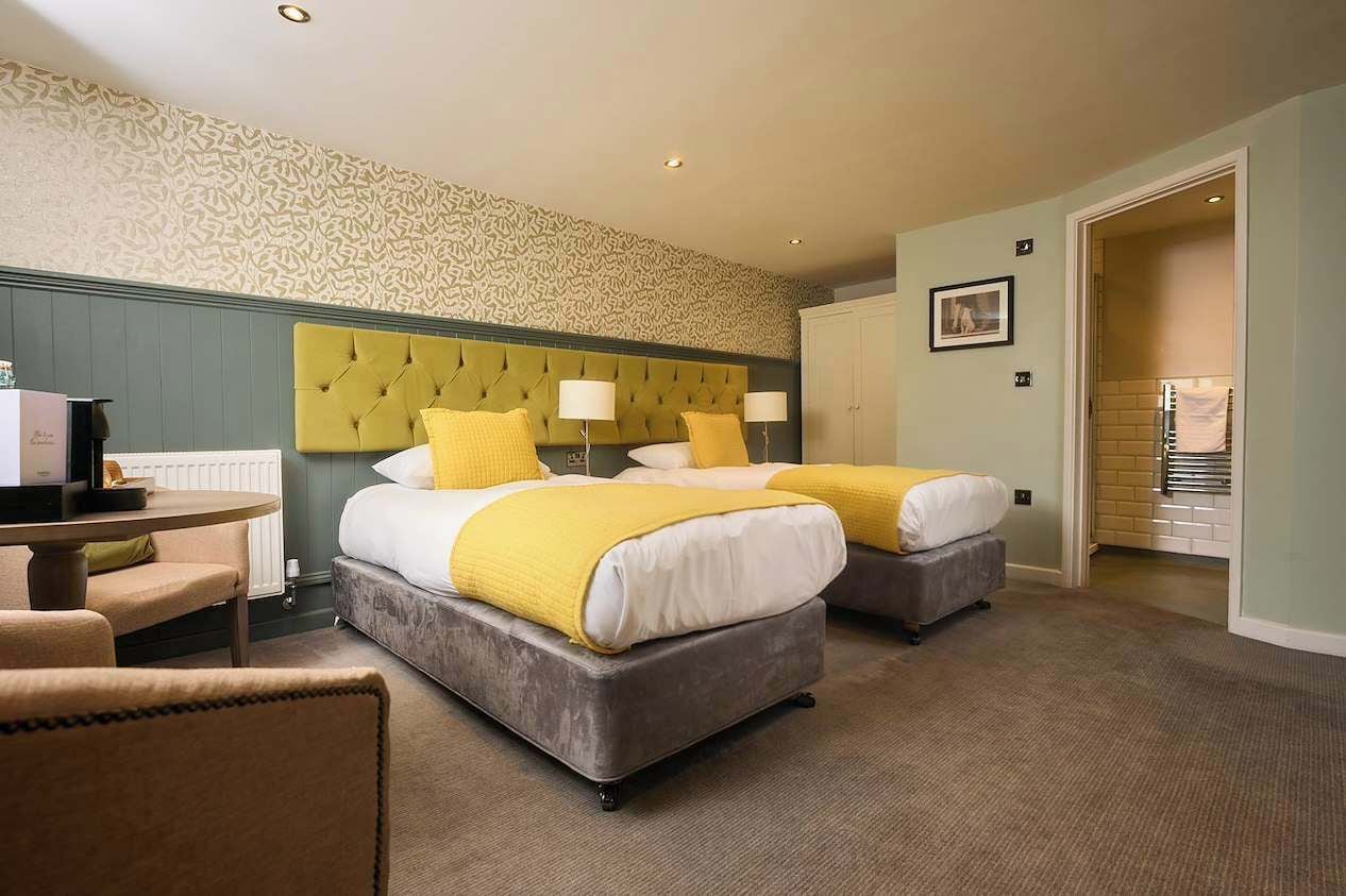 Twin Room | Iron/ironing board (on request), WiFi (free), bed sheets