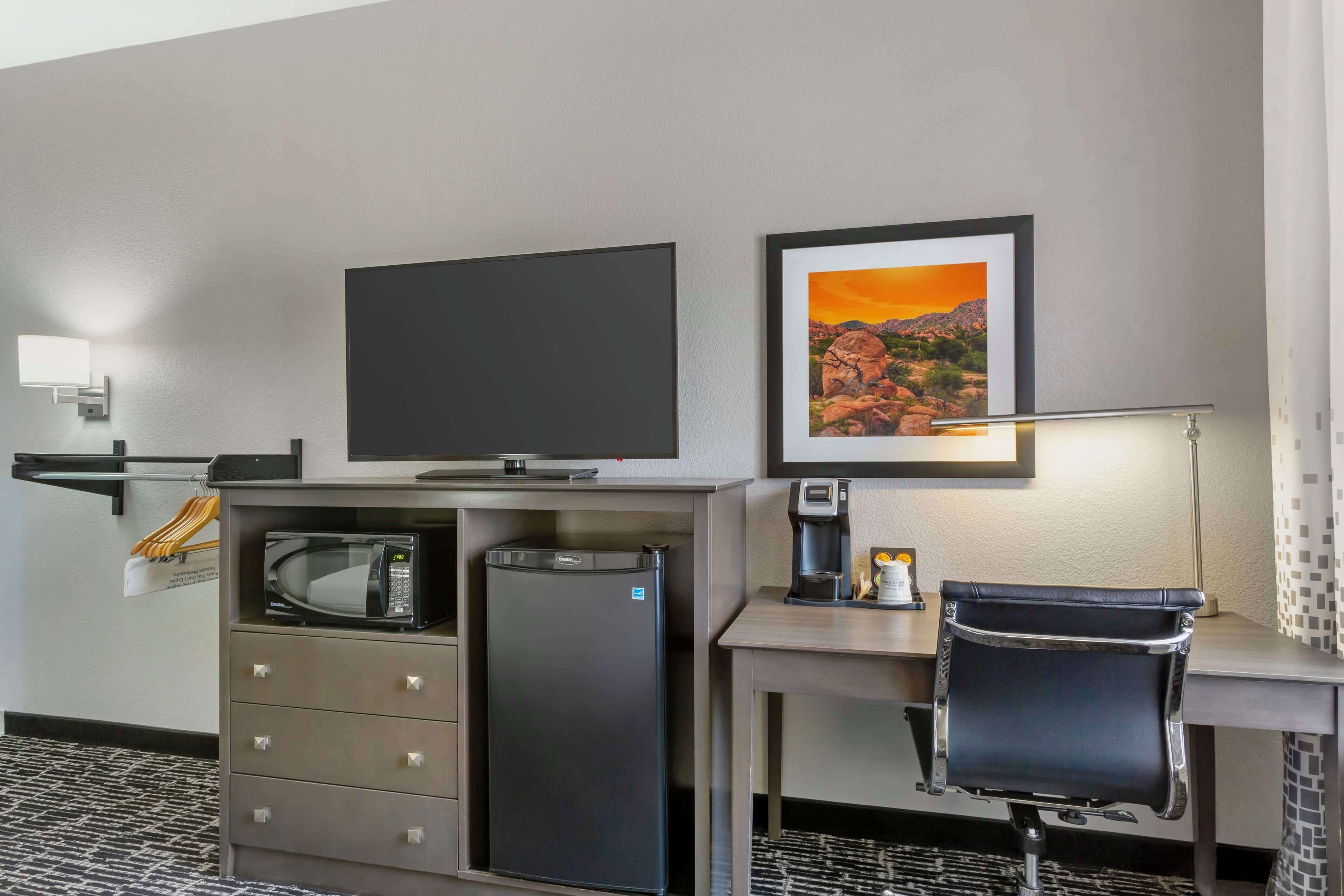 premium bedding, pillow-top beds, desk, laptop workspace